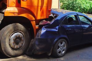 truck hits rear of car