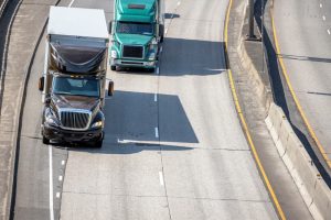 merging highway with trucks